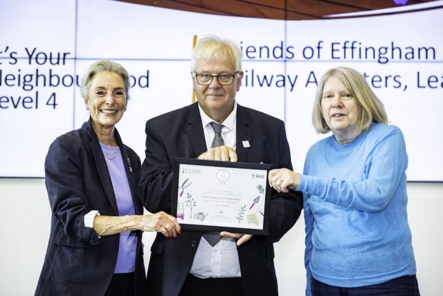 Martha Jessop, Chairman (L) and Vivien White (R), Friends of Effingham Junction Station receiving the certificate at RHS Wisley